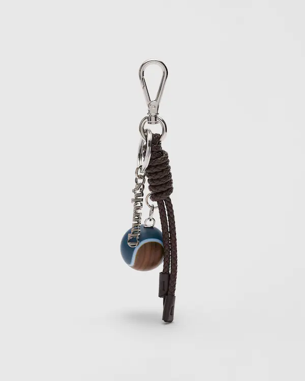 Charm-tennischarm i nappaleder och resin
